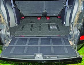 Access to the Outlander's rear cargo area is certainly made easy by this neat 850mm wide drop down door.